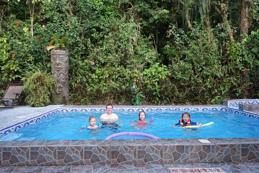 family in a swimming pool