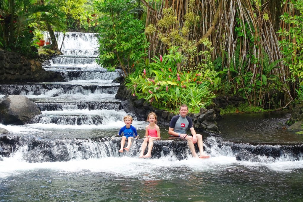 Sitting in the waterfall at Tabacon Hotsprings